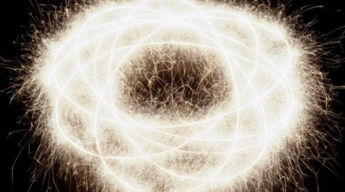 Abstrakcyjny obraz wirującego elektronu