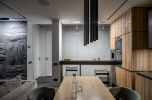 Jak bym oddzielał kuchnię od salonu w mieszkaniu-pracowni bez ścian. 6 efektowne rozwiązania